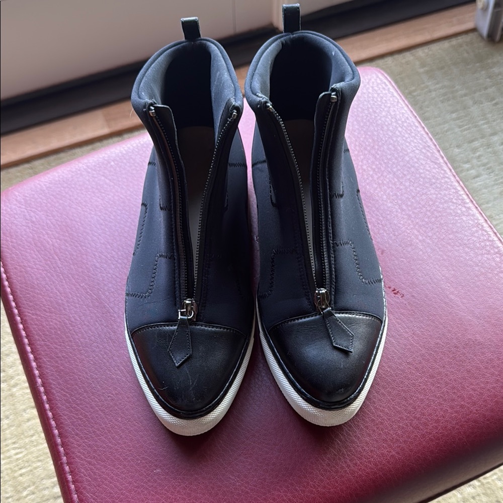 CHANEL Black High-Top Sneakers with White Soles